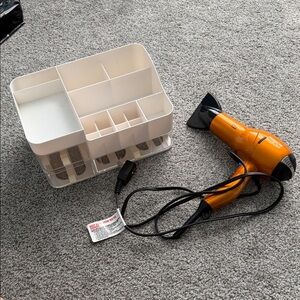 Orange Travel Hair Dryer with Foldable Handle organizer